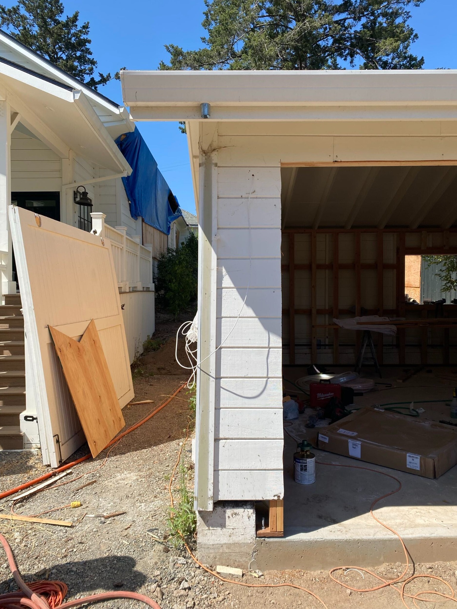 damaged exterior wall during tree damage restoration by js design and build in napa ca